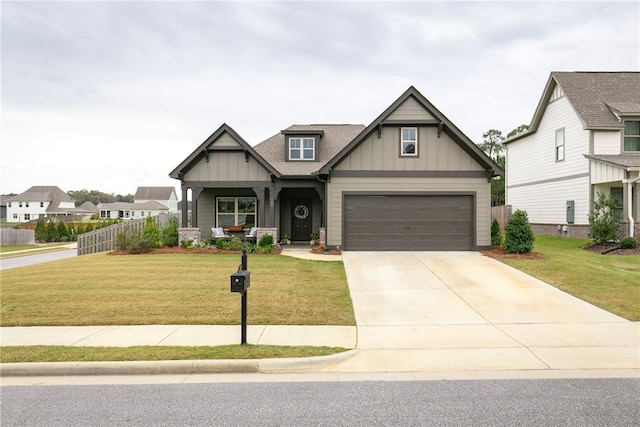 craftsman-style house featuring a front yard