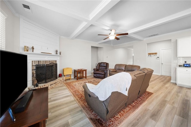 2144 Covey Dr, Auburn, AL 36879 - living area with coffered ceiling, a ceiling fan, light wood-style floors, a fireplace, and beam ceiling