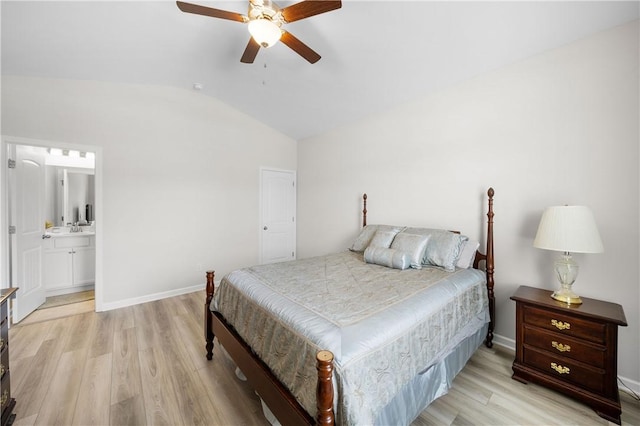 2144 Covey Dr, Auburn, AL 36879 - bedroom with lofted ceiling, light wood-type flooring, a ceiling fan, and ensuite bath