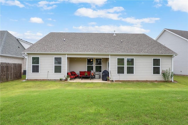 2144 Covey Dr, Auburn, AL 36879 - back of property featuring a patio, an outdoor living space, and a shingled roof