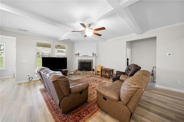 2144 Covey Dr, Auburn, AL 36879 - living area featuring ceiling fan, light wood-style flooring, beamed ceiling, a fireplace, and coffered ceiling