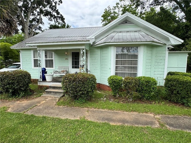 108 Carr St, Tallassee, AL 36078 - view of front of house with a porch and metal roof