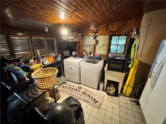 108 Carr St, Tallassee, AL 36078 - washroom featuring separate washer and dryer, tile patterned floors, wooden ceiling, wooden walls, and cooling unit