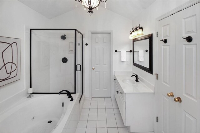 bathroom with lofted ceiling, a jetted tub, tile patterned flooring, vanity, and a shower stall