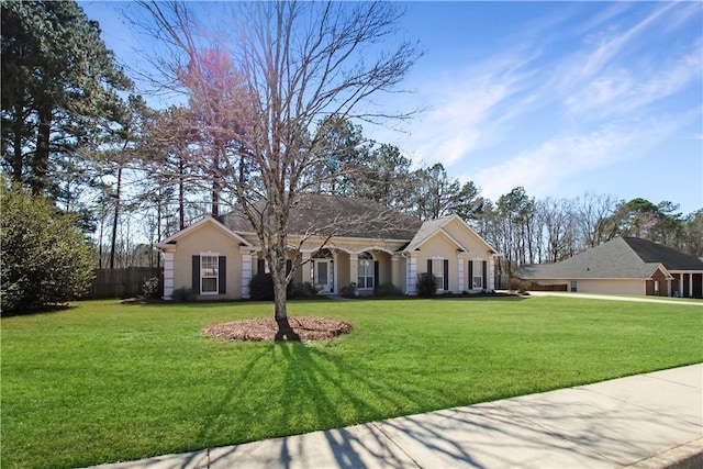 single story home featuring a garage, a front lawn, and stucco siding