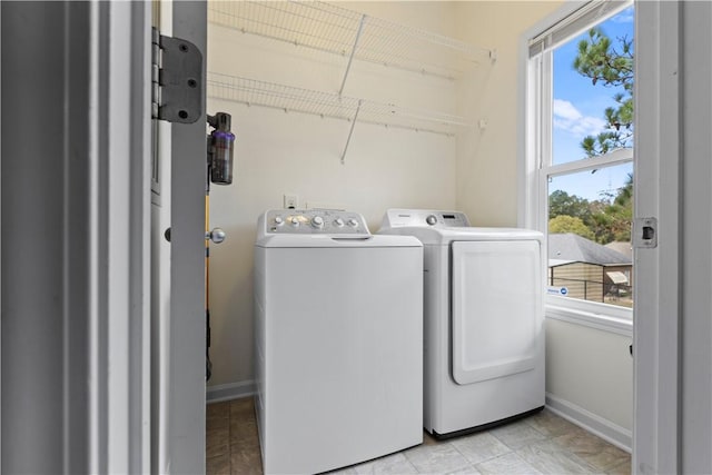 laundry area featuring washer and clothes dryer