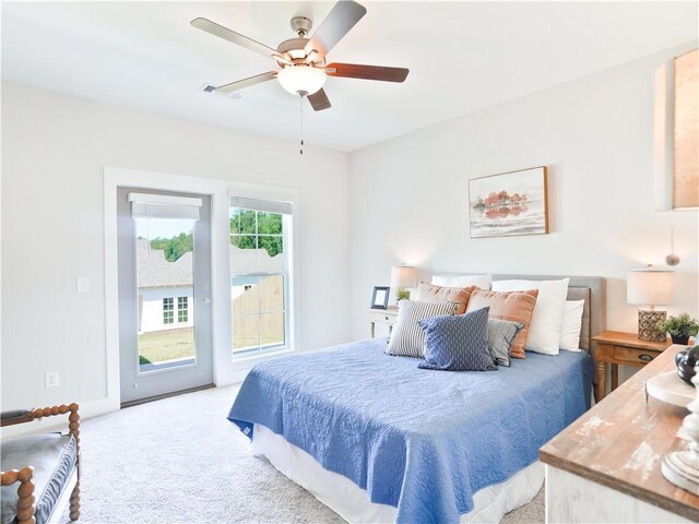 084 Bradley Ln, Auburn, AL 36830 - carpeted bedroom featuring access to exterior and a ceiling fan