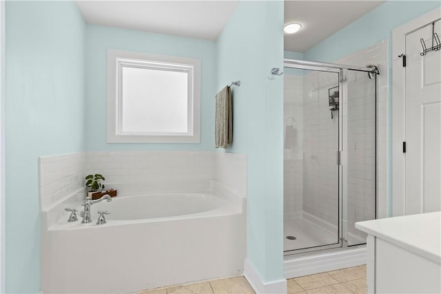 1540 Reynolds Dr, Auburn, AL 36830 - bathroom with a bath, a shower stall, tile patterned flooring, and vanity
