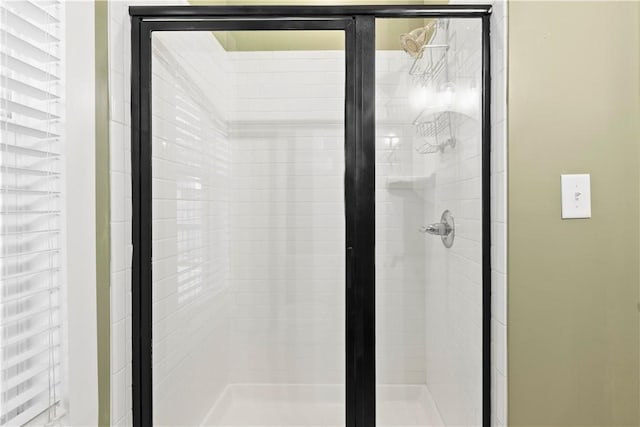 full bath featuring a stall shower