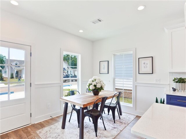 1027 Crossing Ct E, Valley, AL 36854 - dining space featuring plenty of natural light, light wood finished floors, and recessed lighting