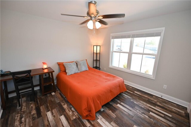 86 Lee Road 2229, Opelika, AL 36804 - bedroom with baseboards, wood finished floors, and a ceiling fan