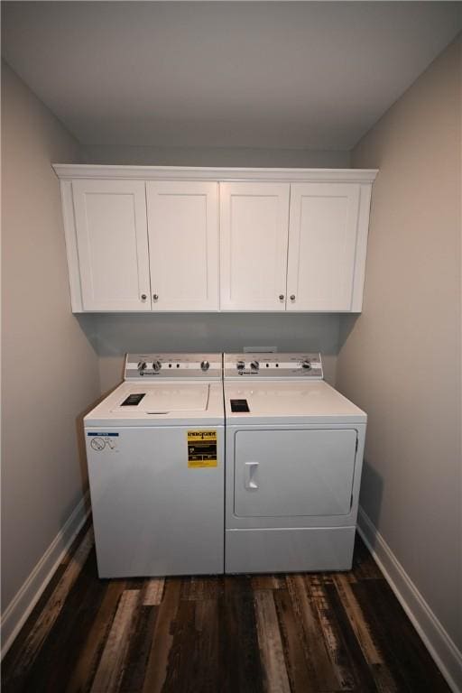 86 Lee Road 2229, Opelika, AL 36804 - washroom with washer and dryer, baseboards, cabinet space, and dark wood-style flooring