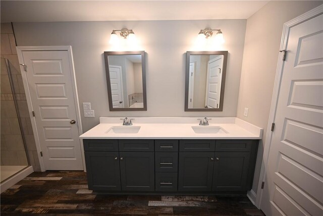86 Lee Road 2229, Opelika, AL 36804 - bathroom featuring double vanity, a shower stall, and wood finished floors