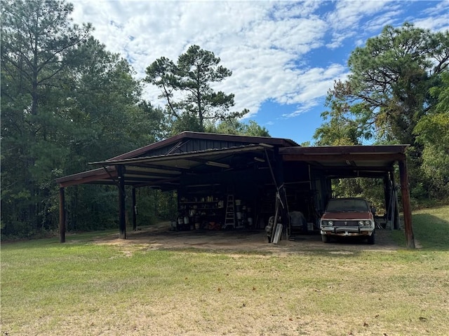 view of parking / parking lot with a lawn