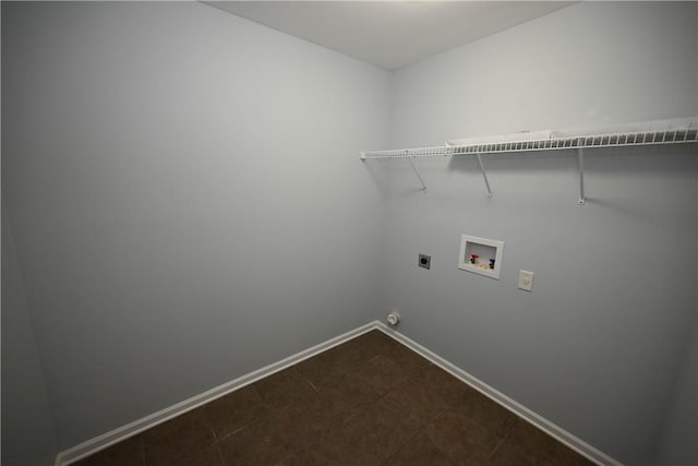 washroom with electric dryer hookup and hookup for a washing machine