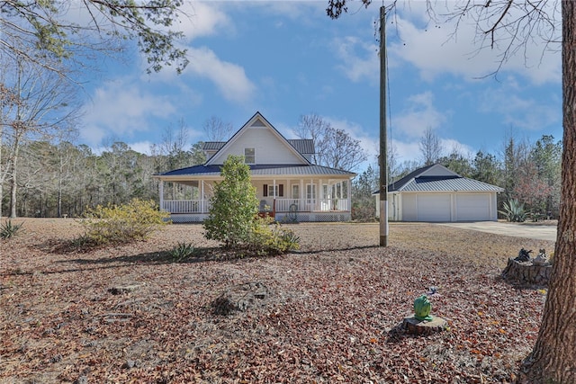 view of front of home featuring a porch and a garage