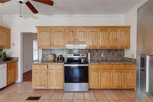 kitchen featuring crown molding, stainless steel appliances, backsplash, and light tile patterned floors