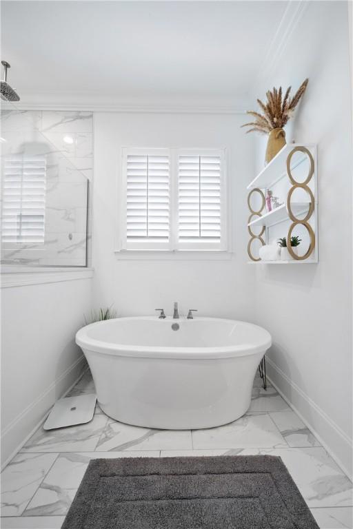 110 Newton Way, Auburn, AL 36830 - full bath with marble finish flooring, a freestanding bath, and ornamental molding