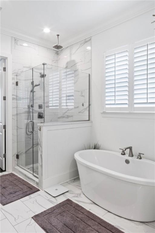 110 Newton Way, Auburn, AL 36830 - full bath featuring marble look tiles, a marble finish shower, a freestanding tub, recessed lighting, and ornamental molding