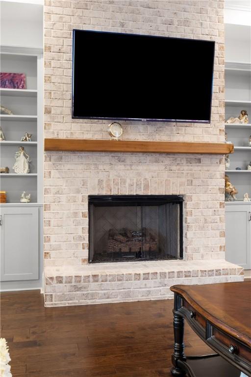 110 Newton Way, Auburn, AL 36830 - detailed view of wood finished floors, a fireplace, and built in shelves