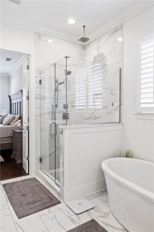 110 Newton Way, Auburn, AL 36830 - bathroom with crown molding, marble look tile flooring, a marble finish shower, a freestanding bath, and connected bathroom