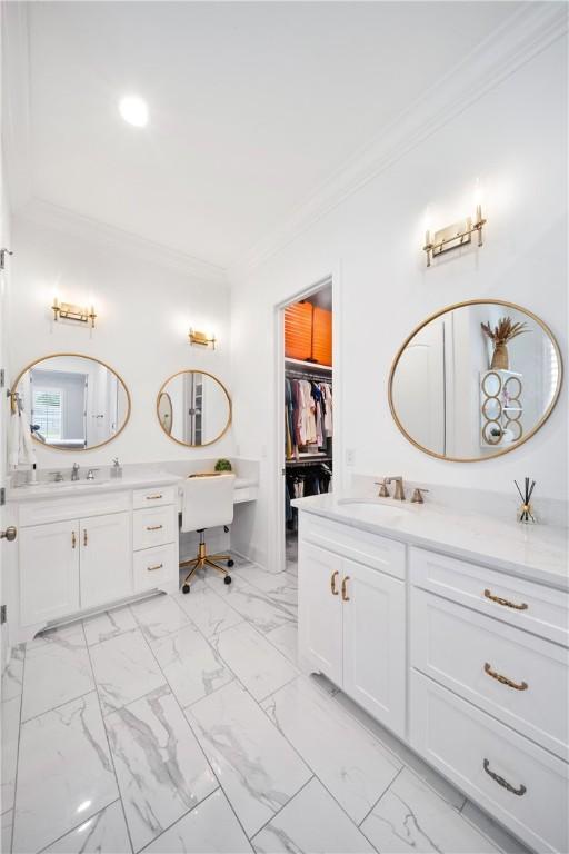 110 Newton Way, Auburn, AL 36830 - full bathroom with ornamental molding, two vanities, marble look tile flooring, and a walk in closet