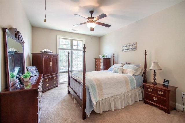 bedroom with light carpet, access to outside, and ceiling fan