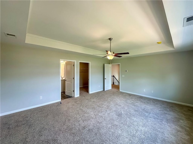 2260 Red Tail Ln, Auburn, AL 36879 - unfurnished bedroom with a raised ceiling, carpet flooring, baseboards, and a spacious closet