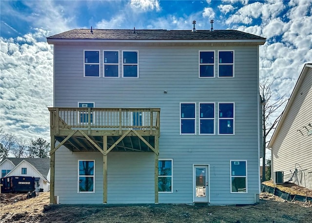 back of house with a balcony