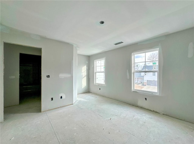 unfurnished bedroom with visible vents