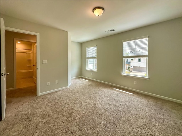 2260 Red Tail Ln, Auburn, AL 36879 - spare room featuring carpet flooring and baseboards