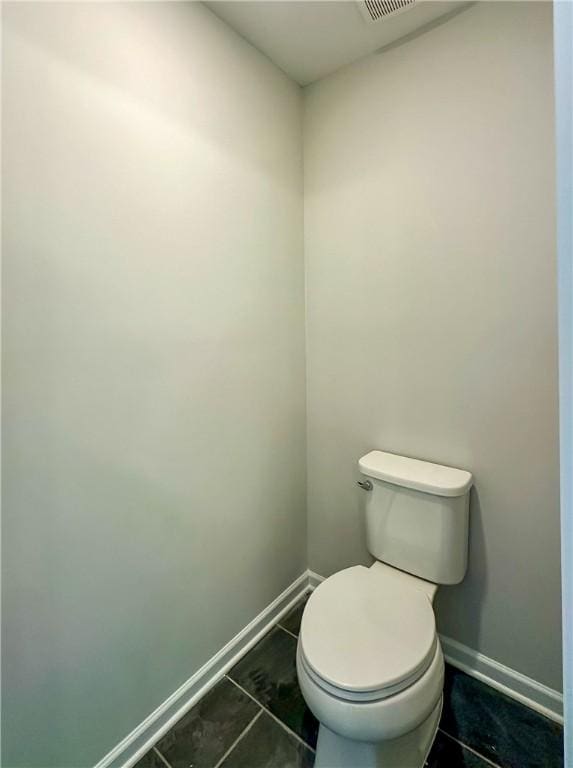 2260 Red Tail Ln, Auburn, AL 36879 - bathroom featuring baseboards and toilet
