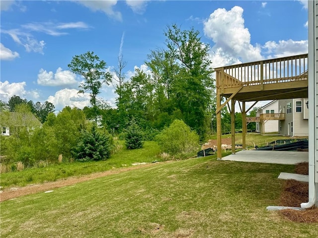 2260 Red Tail Ln, Auburn, AL 36879 - view of green lawn featuring a wooden deck