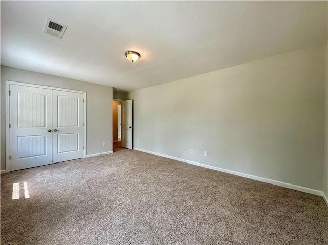 2260 Red Tail Ln, Auburn, AL 36879 - unfurnished bedroom with carpet, baseboards, and a closet