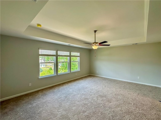 2260 Red Tail Ln, Auburn, AL 36879 - carpeted empty room featuring a raised ceiling, a ceiling fan, and baseboards