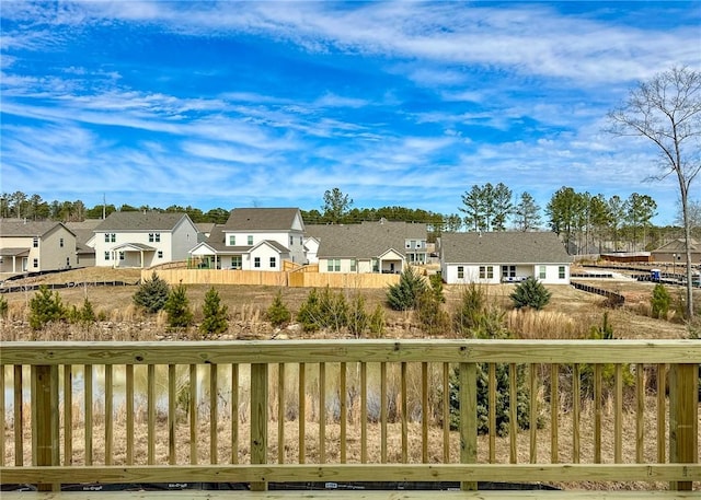 rear view of property with a water view