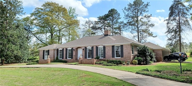 2104 Oak Bowery Rd, Opelika, AL 36801 - ranch-style house featuring a front yard, brick siding, concrete driveway, and a chimney
