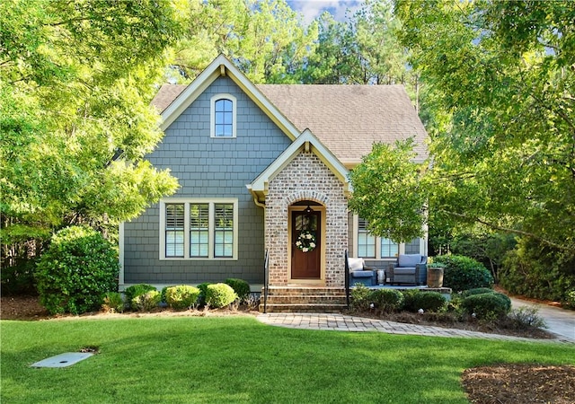 view of front of home with a front yard