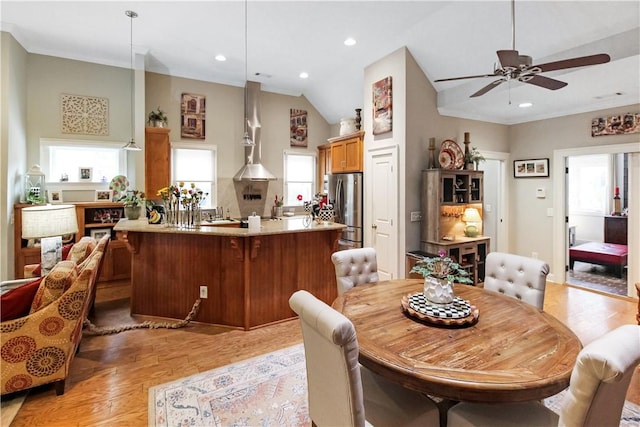 3403 Double Eagle Ln, Opelika, AL 36801 - dining area with light wood finished floors, a ceiling fan, recessed lighting, and vaulted ceiling