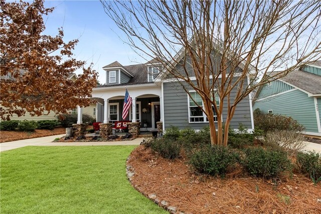 3403 Double Eagle Ln, Opelika, AL 36801 - view of front of home with a porch and a front yard