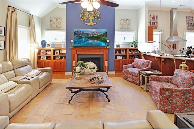 3403 Double Eagle Ln, Opelika, AL 36801 - living area with ceiling fan, a fireplace, and lofted ceiling