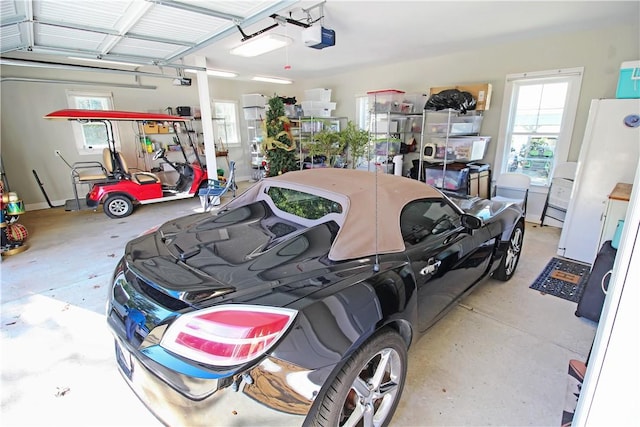 3403 Double Eagle Ln, Opelika, AL 36801 - garage featuring a garage door opener