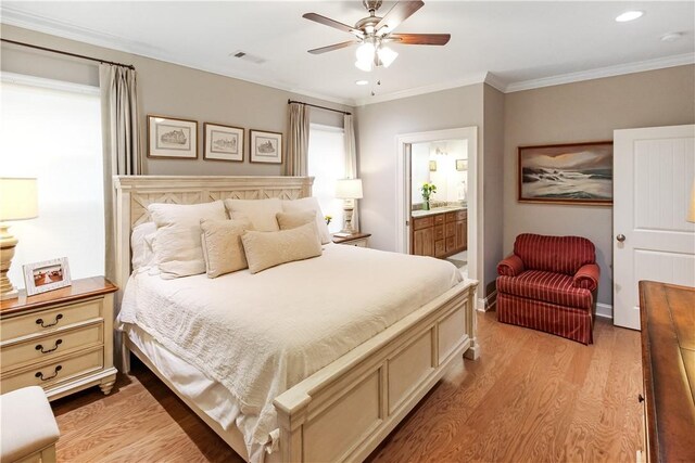 3403 Double Eagle Ln, Opelika, AL 36801 - bedroom featuring light wood-style floors, crown molding, recessed lighting, ensuite bathroom, and ceiling fan