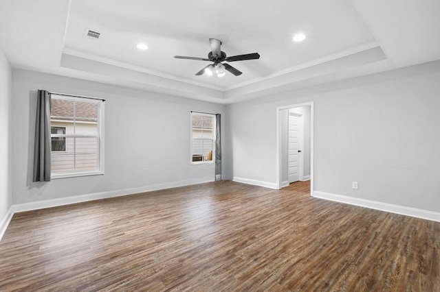1431 Lowndes St, Opelika, AL 36801 - empty room with a tray ceiling, crown molding, plenty of natural light, baseboards, and recessed lighting