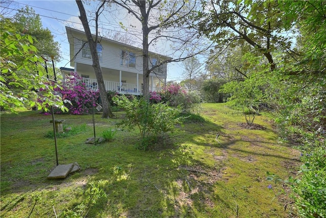 view of yard with a porch