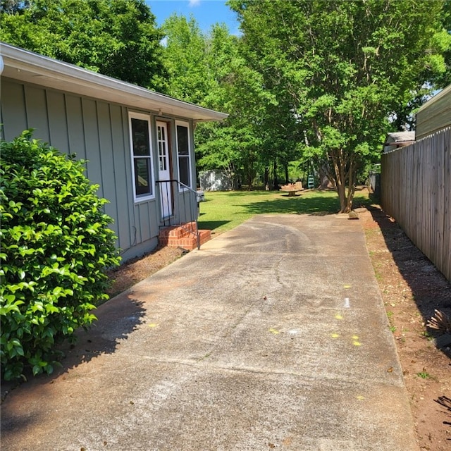 view of patio / terrace featuring fence