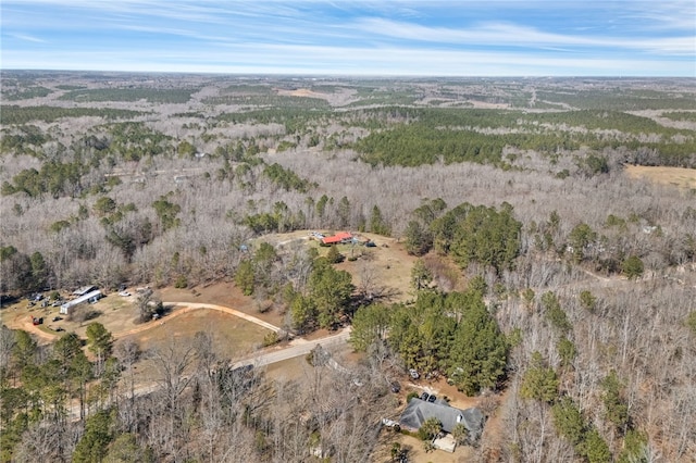 aerial view featuring a view of trees