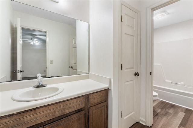 283 Ivy Ln, Auburn, AL 36830 - bathroom with vanity, wood finished floors, and a ceiling fan