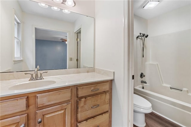 283 Ivy Ln, Auburn, AL 36830 - full bath with vanity, washtub / shower combination, and wood finished floors