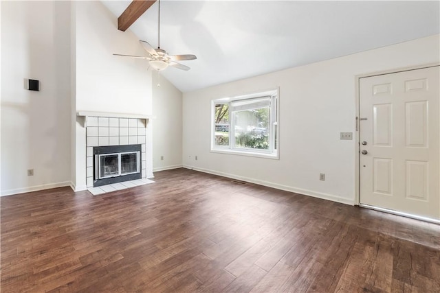 283 Ivy Ln, Auburn, AL 36830 - unfurnished living room featuring a ceiling fan, dark wood finished floors, and a tile fireplace